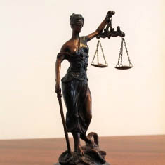 Bronze statue of the scales of justice